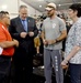 DSD Bob Work and his wife attend the 2015 Defense Department Warrior Games shooting competition