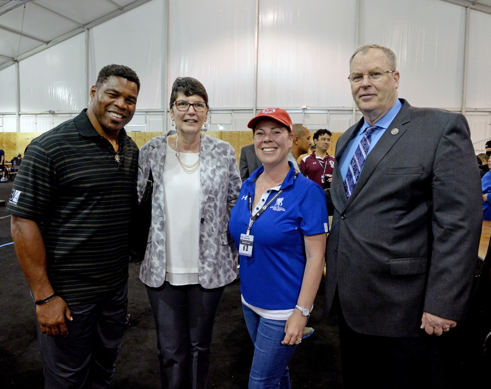 DSD Bob Work and his wife attend the 2015 Defense Department Warrior Games shooting competition
