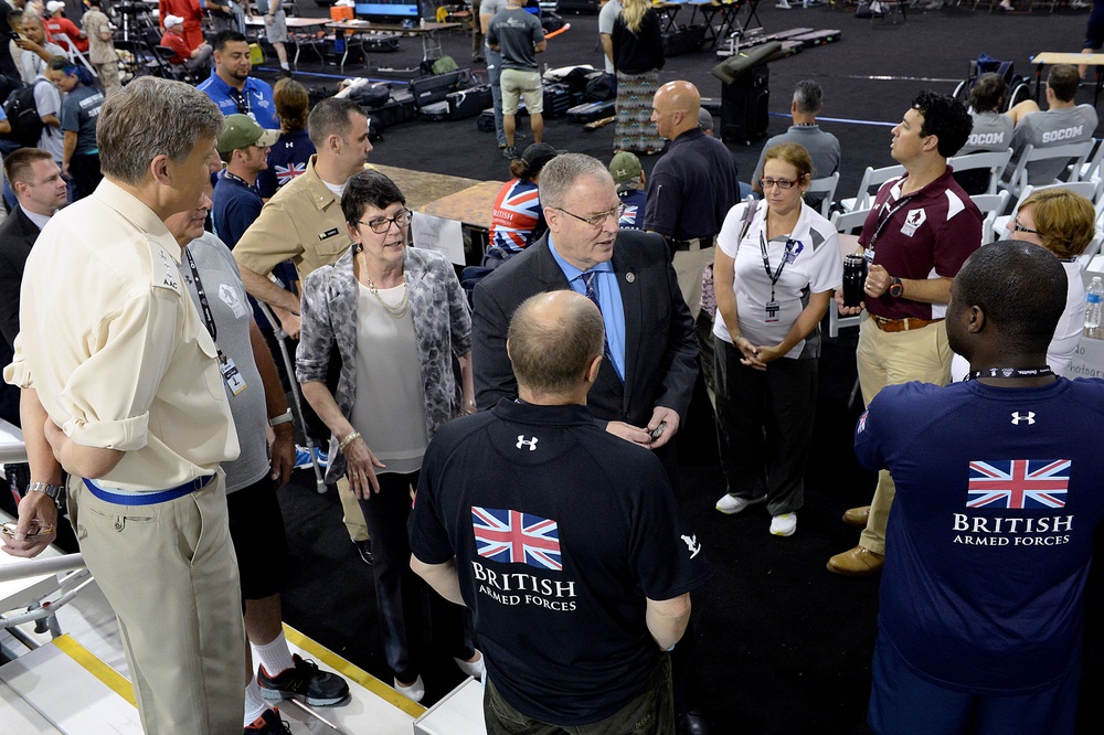 DSD Bob Work and his wife attend the 2015 Defense Department Warrior Games shooting competition
