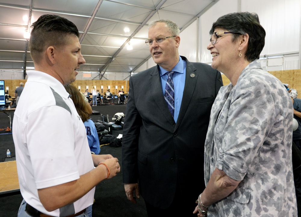 DSD Bob Work and his wife attend the 2015 Defense Department Warrior Games shooting competition