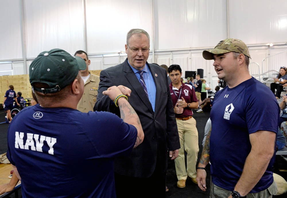 DSD Bob Work  and his wife attend the 2015 Defense Department Warrior Games shooting competition