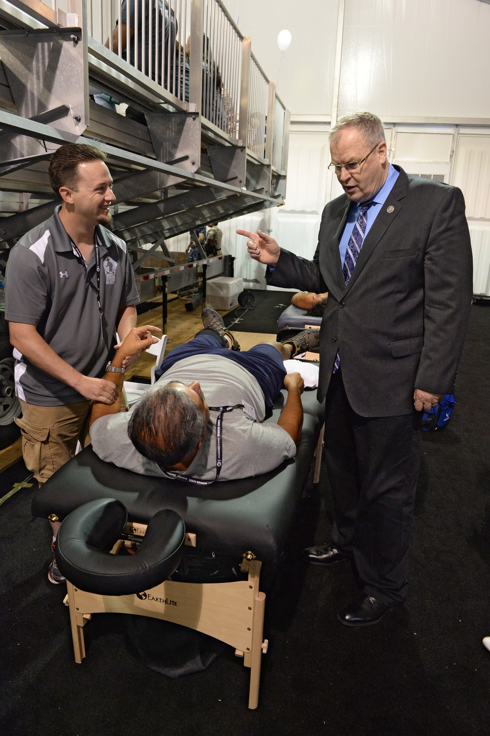 DSD Bob Work and his wife attend the 2015 Defense Department Warrior Games shooting competition