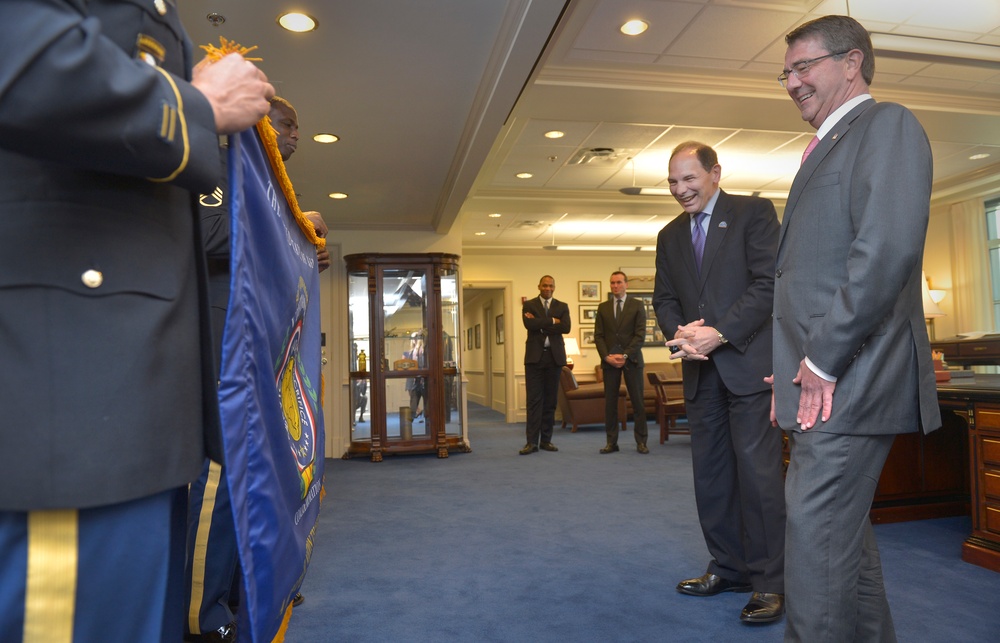 SecDef presents VA secretary with commemorative flag