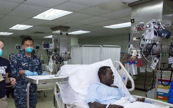 USNS Mercy (T-AH 19) transports six injured from Bougainville to ship for critical care