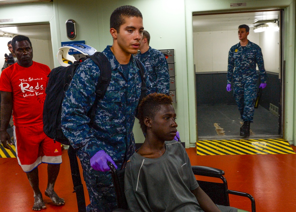 USNS Mercy transports injured people from Papua New Guinea to ship for emergency care during Pacific Partnership 2015