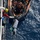 Coast Guardsmen from the Cutter Midgett transfer of 1,760 pounds cocaine
