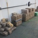 Coast Guard Midgett lined with stacks of interdicted contraband