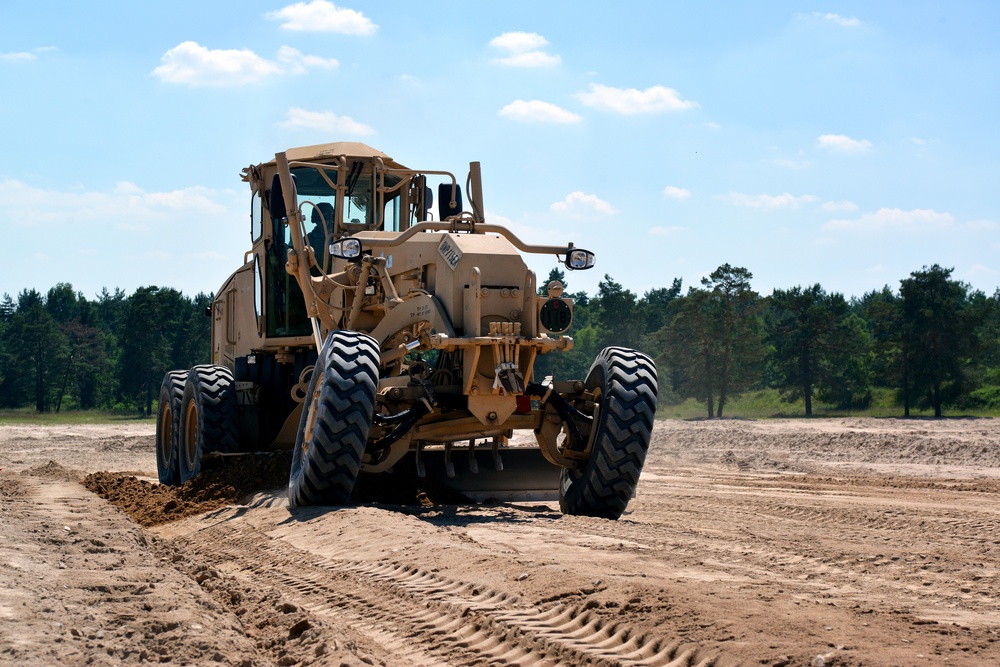 120M Motor Grader performs dig site operations