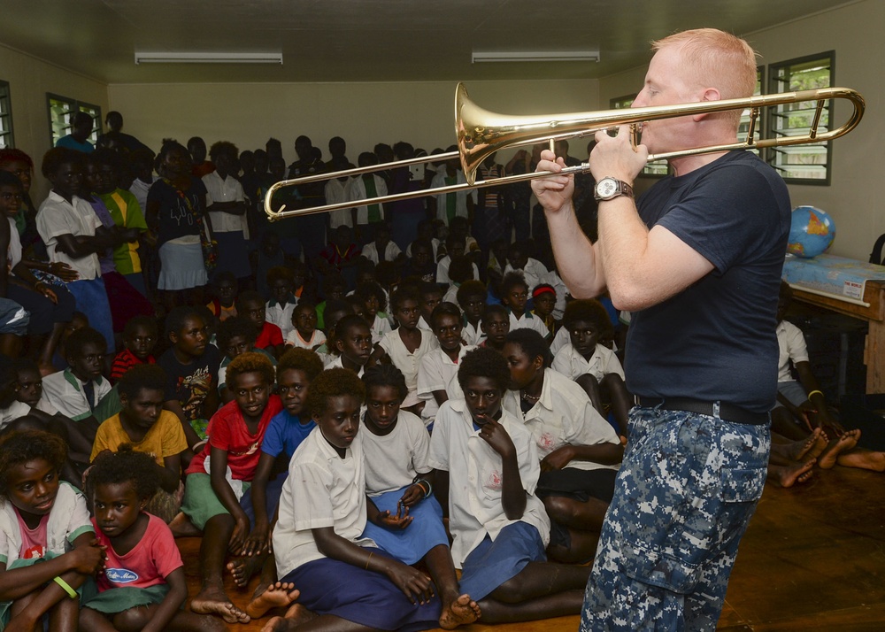 Pacific Fleet Band performs at primary school during Pacific Partnership 2015