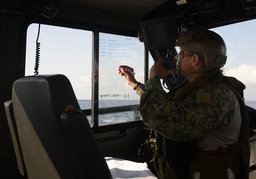 US Navy Sailors with the Coastal Riverine Squadron One patrol the waters of East Africa