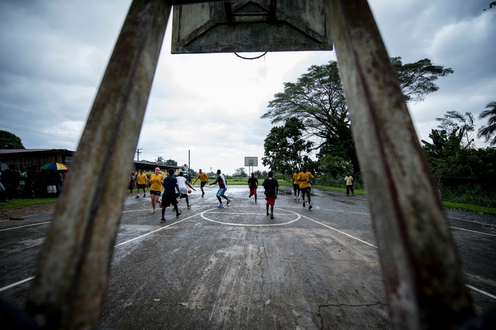 Sailors play sports with students from Arawa Secondary School during Pacific Partnership
