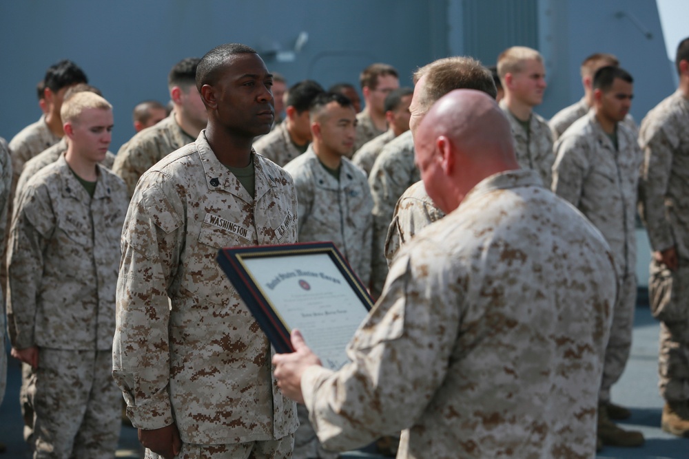 U.S. Marines get promoted aboard Anchorage