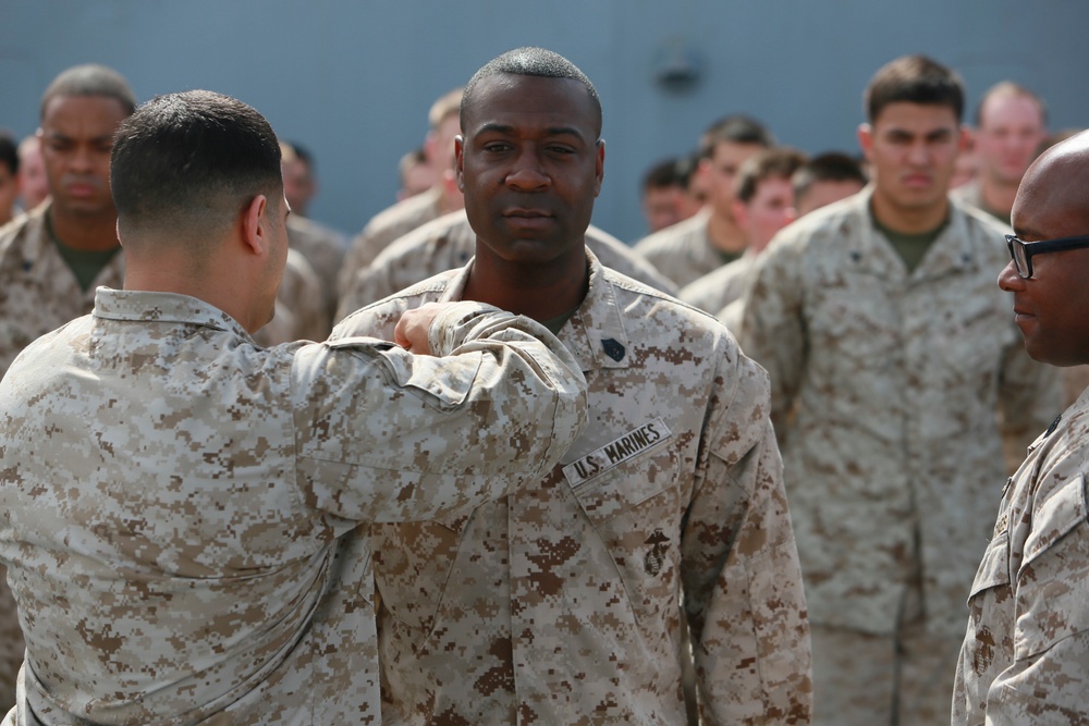 U.S. Marines get promoted aboard Anchorage