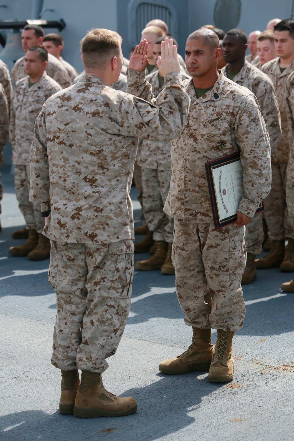 U.S. Marines get promoted aboard Anchorage