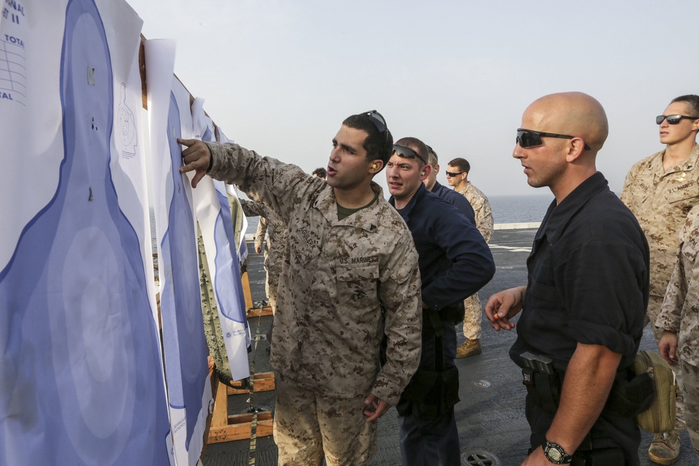 U.S. Marines guide Sailors during VBSS training