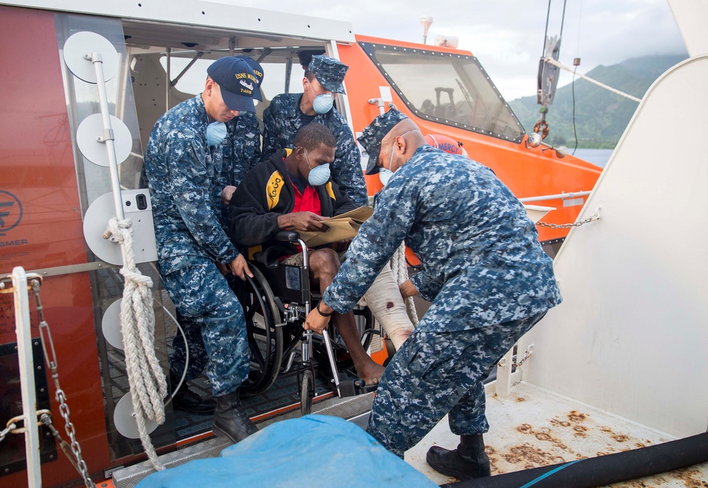 USNS Mercy brings patients aboard in Rabual