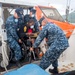 USNS Mercy brings patients aboard in Rabual