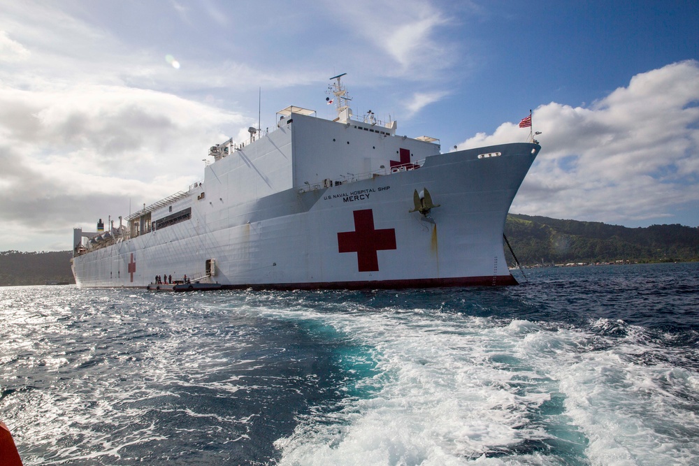 USNS Mercy brings patients aboard in Rabual