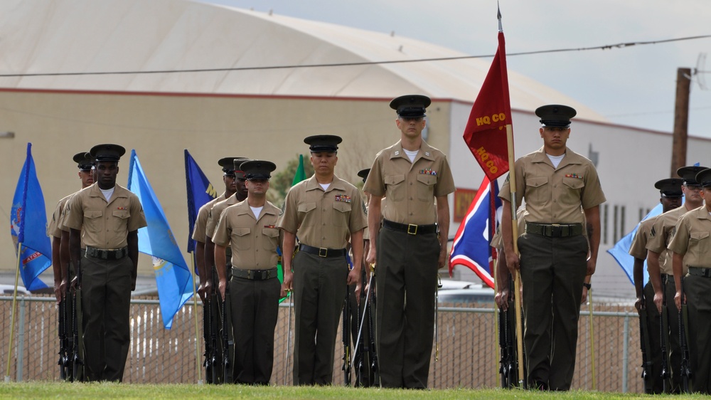 Capt. Adam Hemme, company commander of Fleet Services Division, leads Marines during change of command ceremony aboard Marine Corps Logistics Base Barstow, Calif., July 1