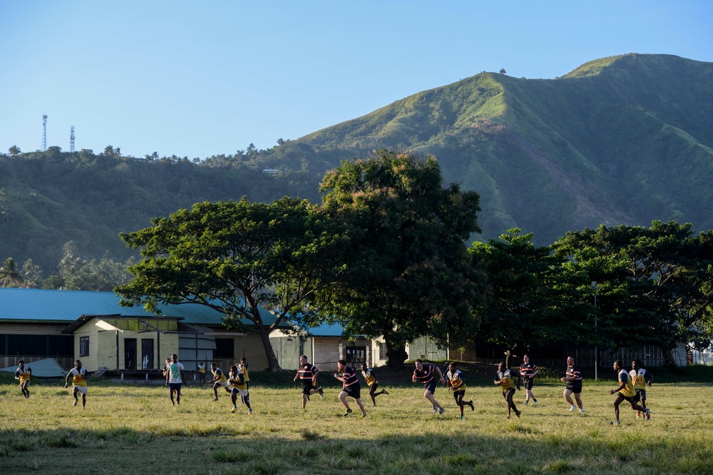 USNS Mercy rugby team practices with Rabaul Redskins during Pacific Partnership 2015