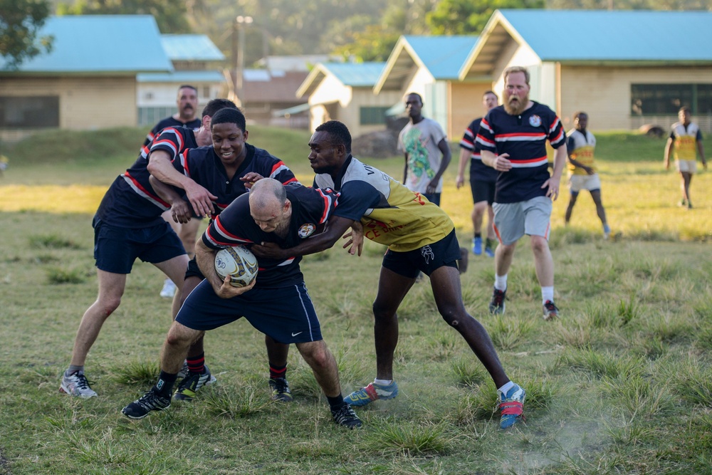 USNS Mercy rugby team practices with Rabaul Redskins during Pacific Partnership 2015