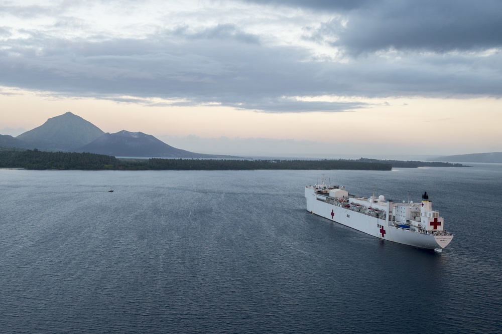 Mercy sits at anchorage in Simpson Harbor in Rabaul during Pacific Partnership 2015