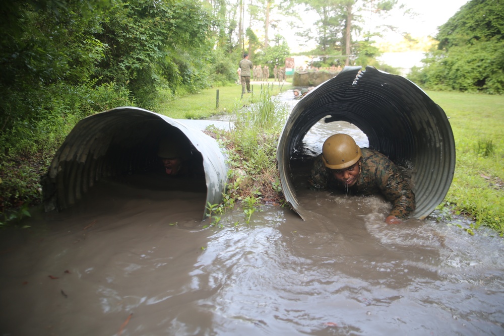 Service Company conquers endurance course obstacles, swamps