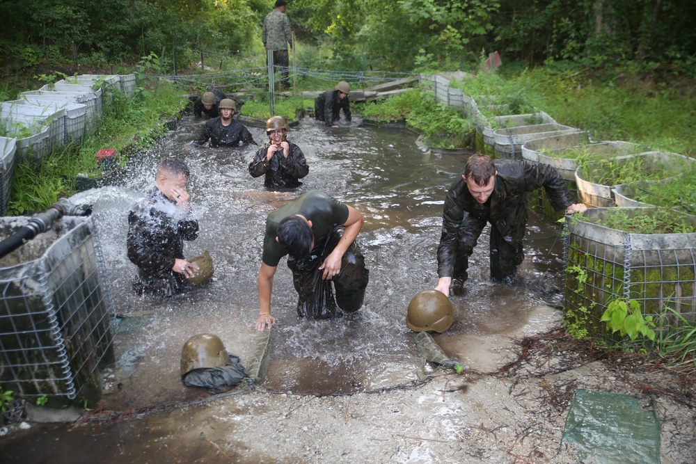 Service Company conquers endurance course obstacles, swamps
