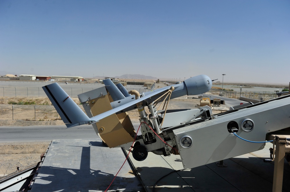 ScanEagle unmanned aerial vehicle from ScanEagle Guardian Eight Site sits ready for launch by Rear Adm. Luke McCollum at Kandahar Airfield June 25, 2015