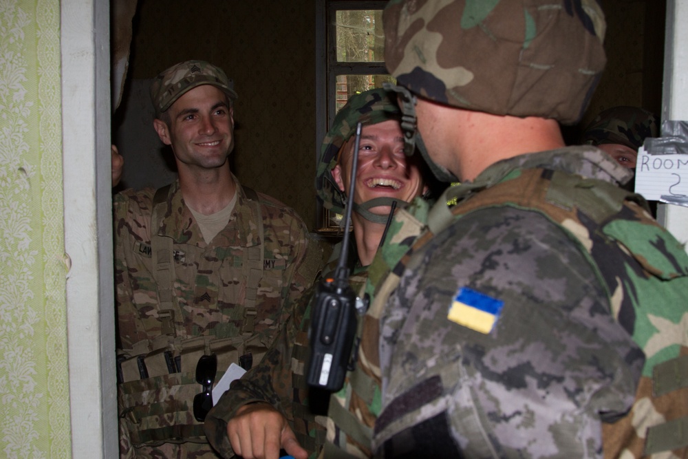 Ukrainian guardsmen conduct sensitive site exploitation and react to contact