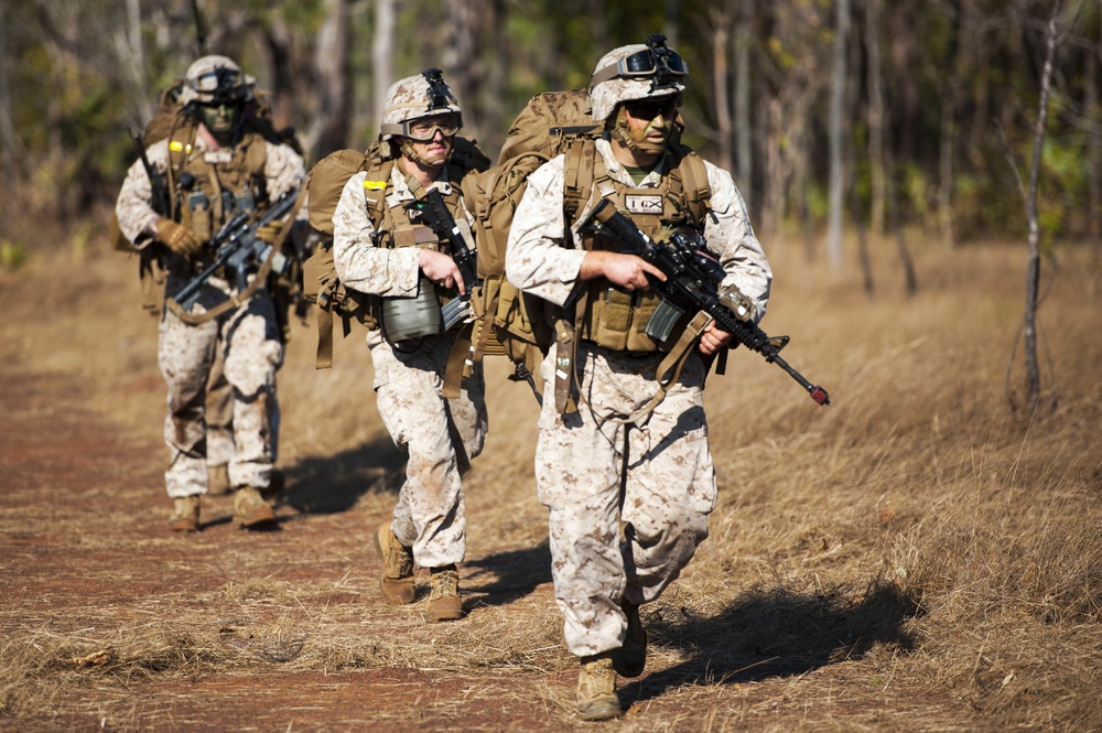 U.S. Marines set up a perimeter after a tactical insertion as part of an amphibious assault during Talisman Sabre 2015