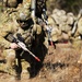 Australian Army soldiers set up a perimeter after a tactical insertion as part of an amphibious assault during Talisman Sabre 2015