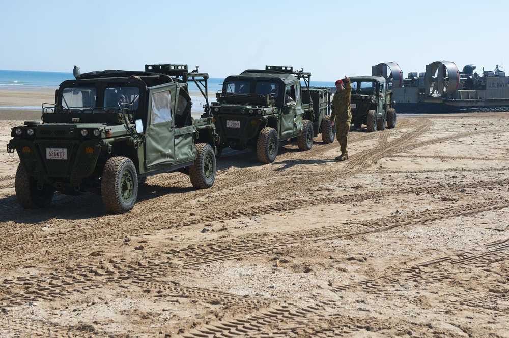 U.S. Marines unload cargo and equipment from a landing craft air cushion vehicle during Talisman Sabre 2015