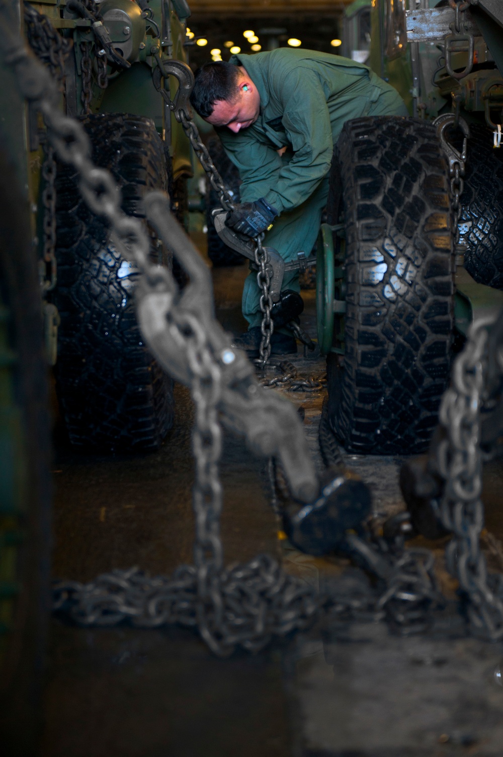 U.S. Sailor secures equipment and cargo onto a landing craft air cushion vehicle during Talisman Sabre 2015