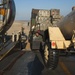 U.S. Sailor offloads a cargo truck from a landing craft air cushion vehicle during Talisman Sabre 2015