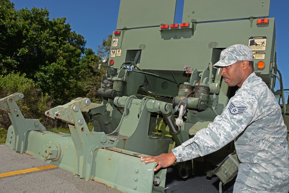 290th vehicle maintenance technicians collect downed Humvee