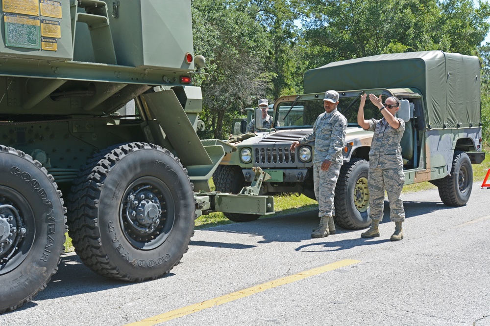 290th vehicle maintenance technicians collect downed Humvee