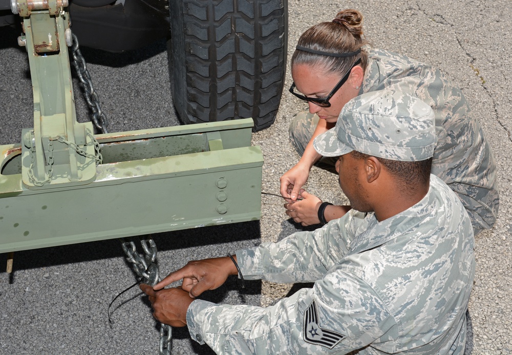 290th vehicle maintenance technicians collect downed Humvee