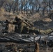 Australian soldiers and U.S. Marines air assault through a mock enemy objective