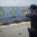 Gun shoot aboard USS Ross