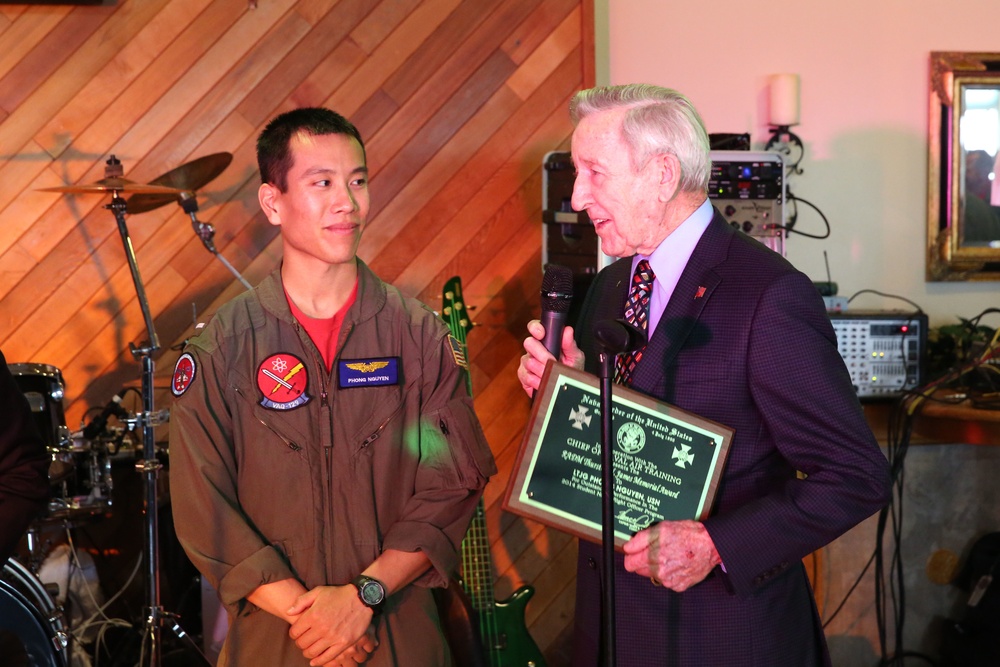 Former CNO presents award