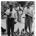 Men with chickens