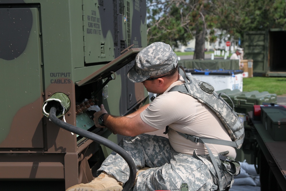 Soldier prepares electricity for IRT mission
