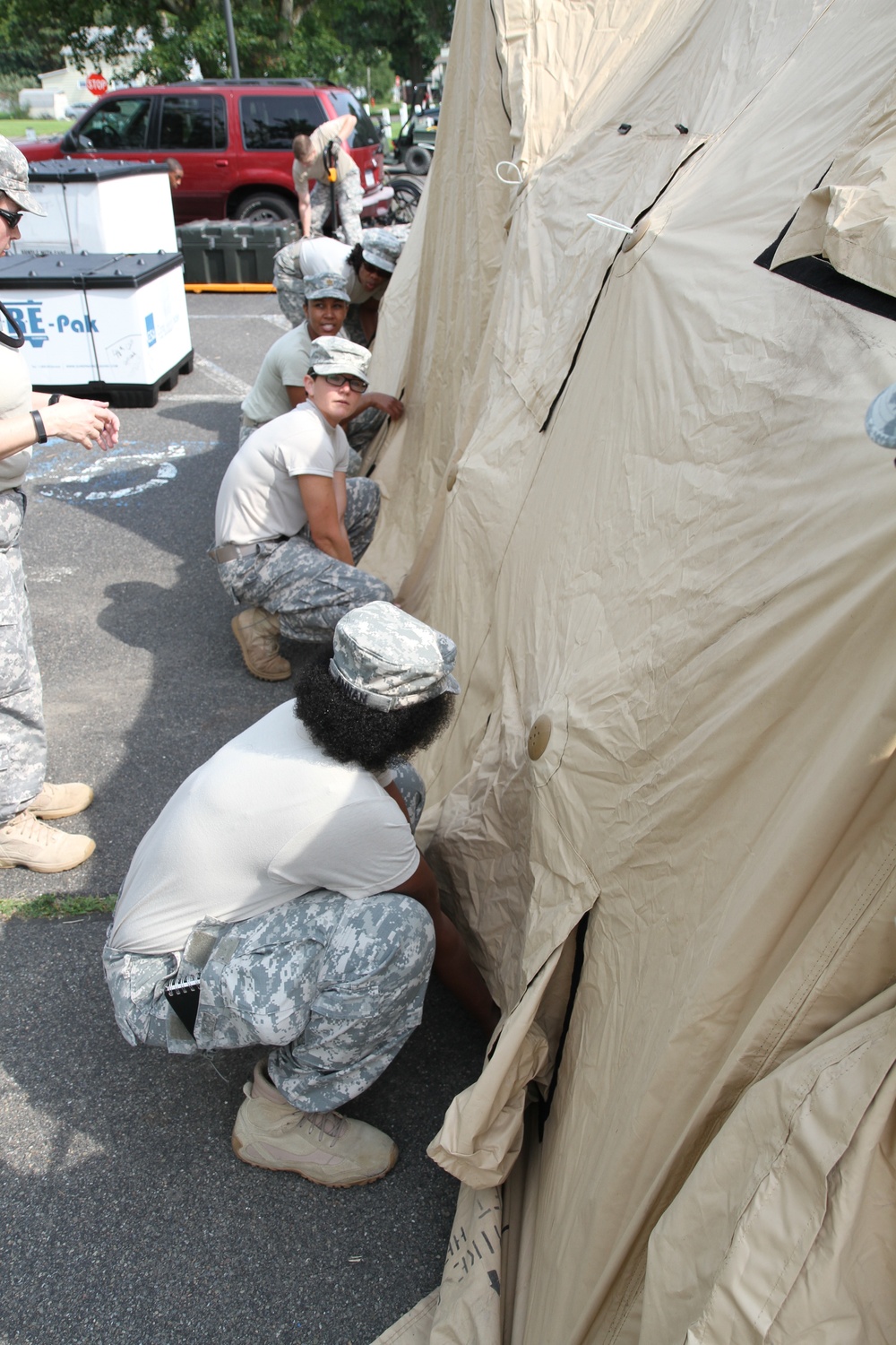 Service members prepare tents for IRT in Norwich, NY
