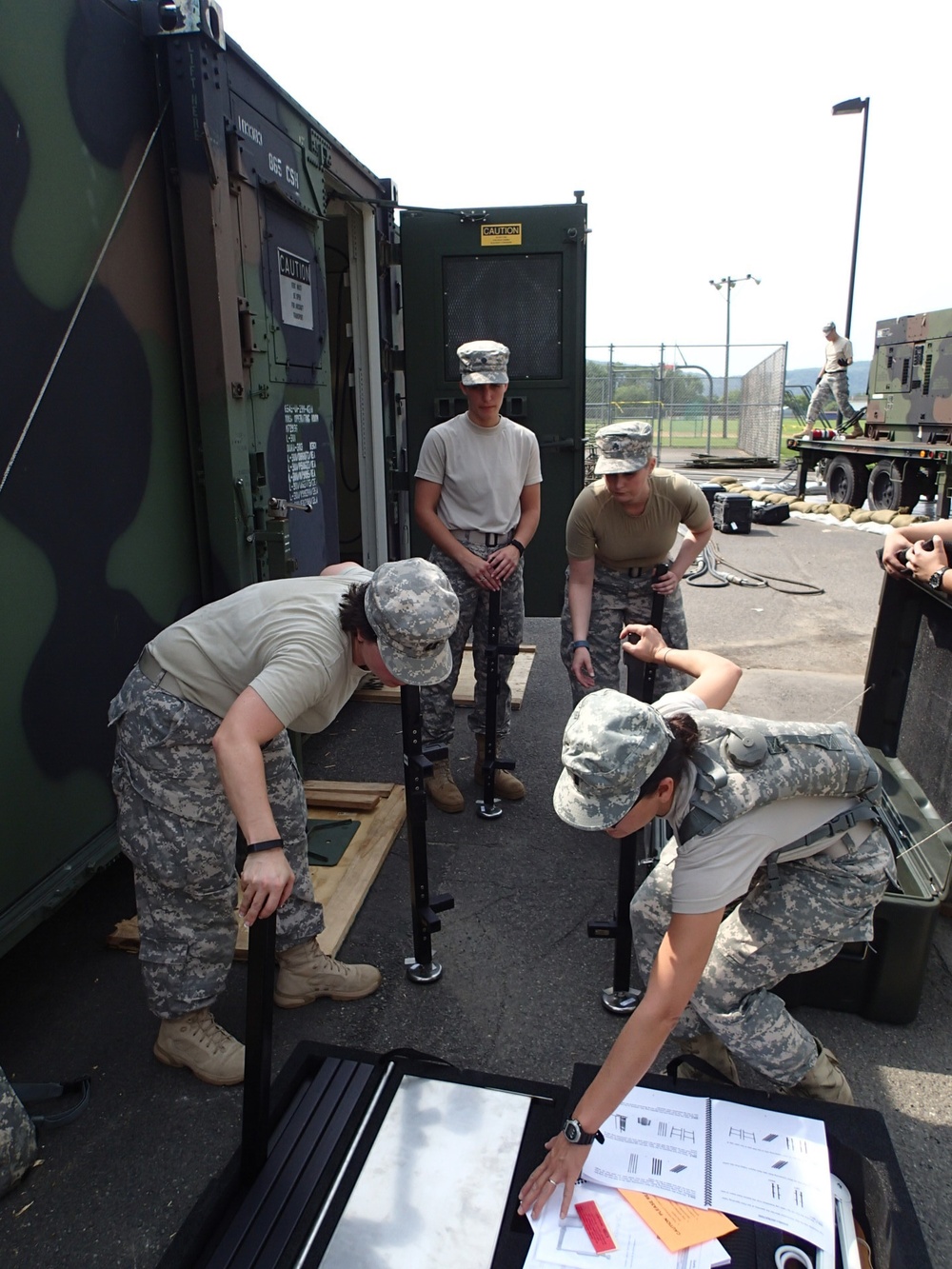 Soldiers prepare surgical tables for IRT in Norwich, NY