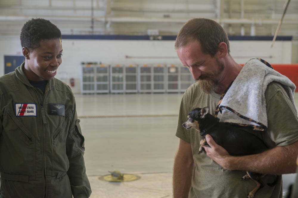 Survivor, his dog meet their Coast Guard heroes