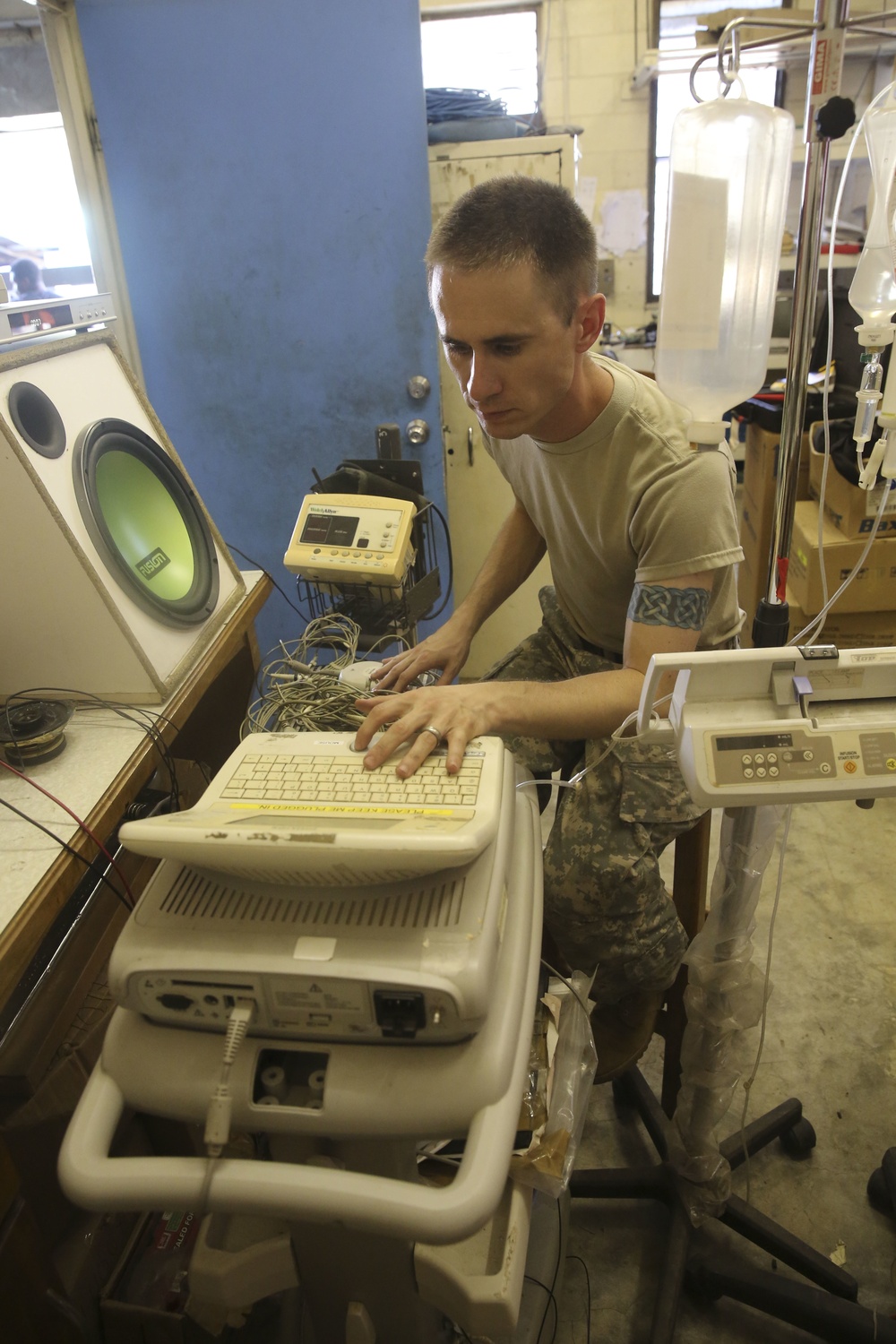 Army biomed technician repairs medical equipment in Honiara