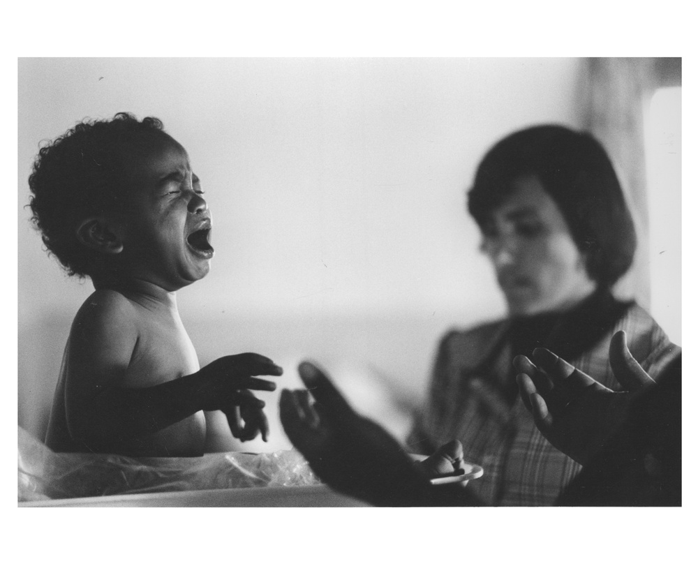 Baby being weighed at health center