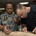 Mercy crew conducts suture training during Pacific Partnership 2015.