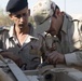 Iraqi Army Soldiers train on mine sweeping and vehicle maintenance